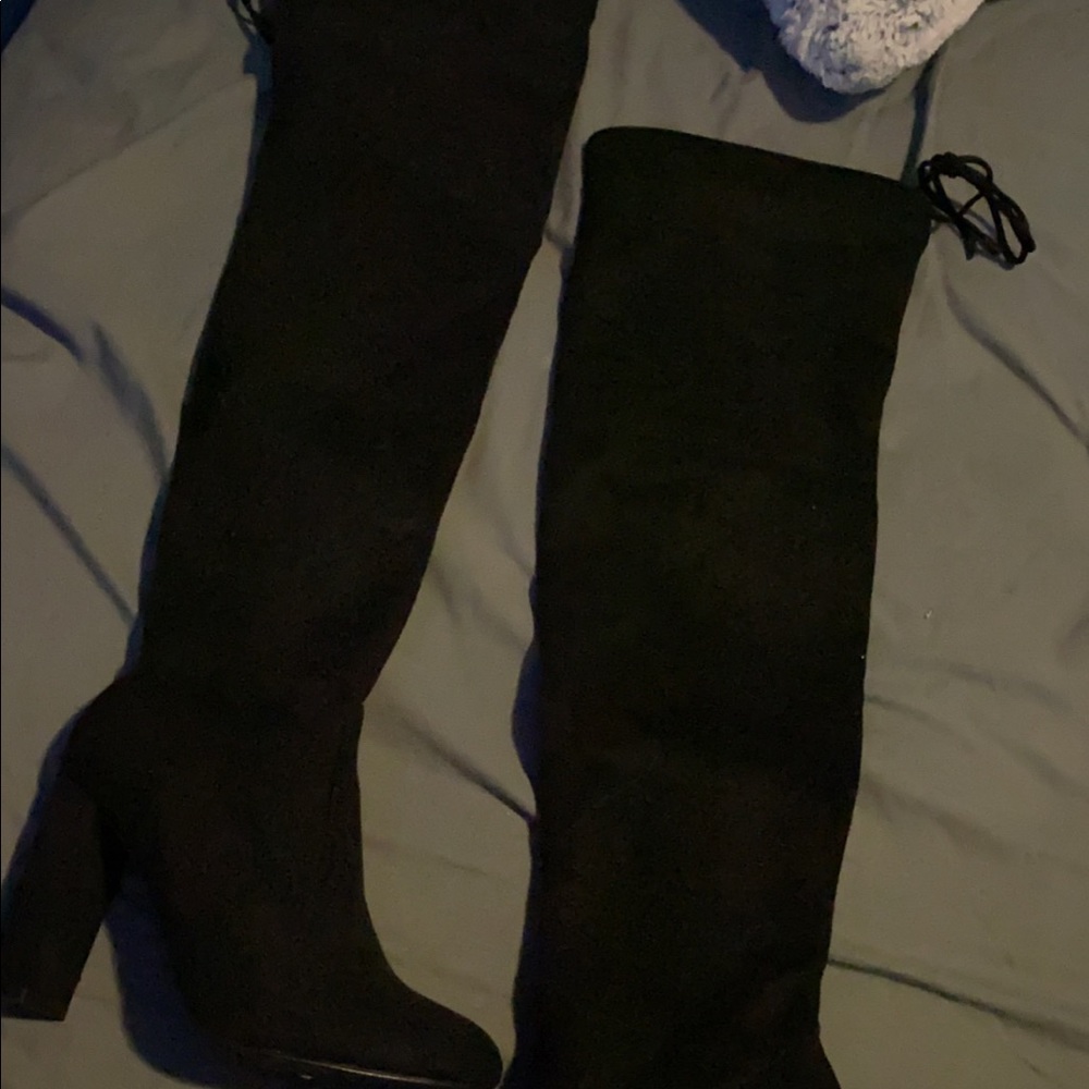 Heeled knee high boots